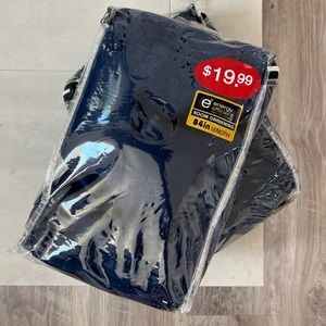 Two NEW E2 Energy Efficient Room Darkening Navy Curtain Panels 84” in length.